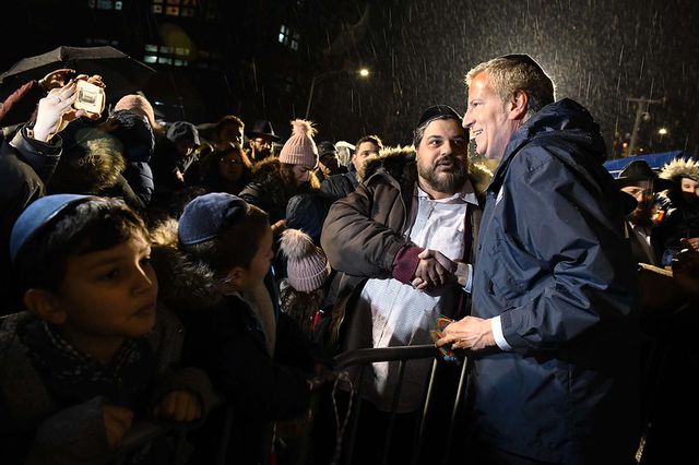 Mayor de Blasio delivers remarks at the menorah lighting and impromptu rally at Grand Army Plaza on Sunday night